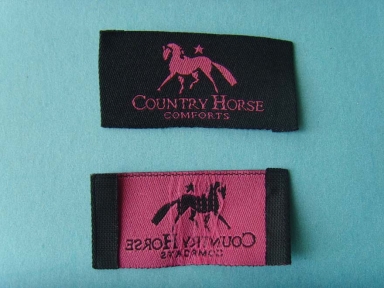 black and pink horse loop fold woven label